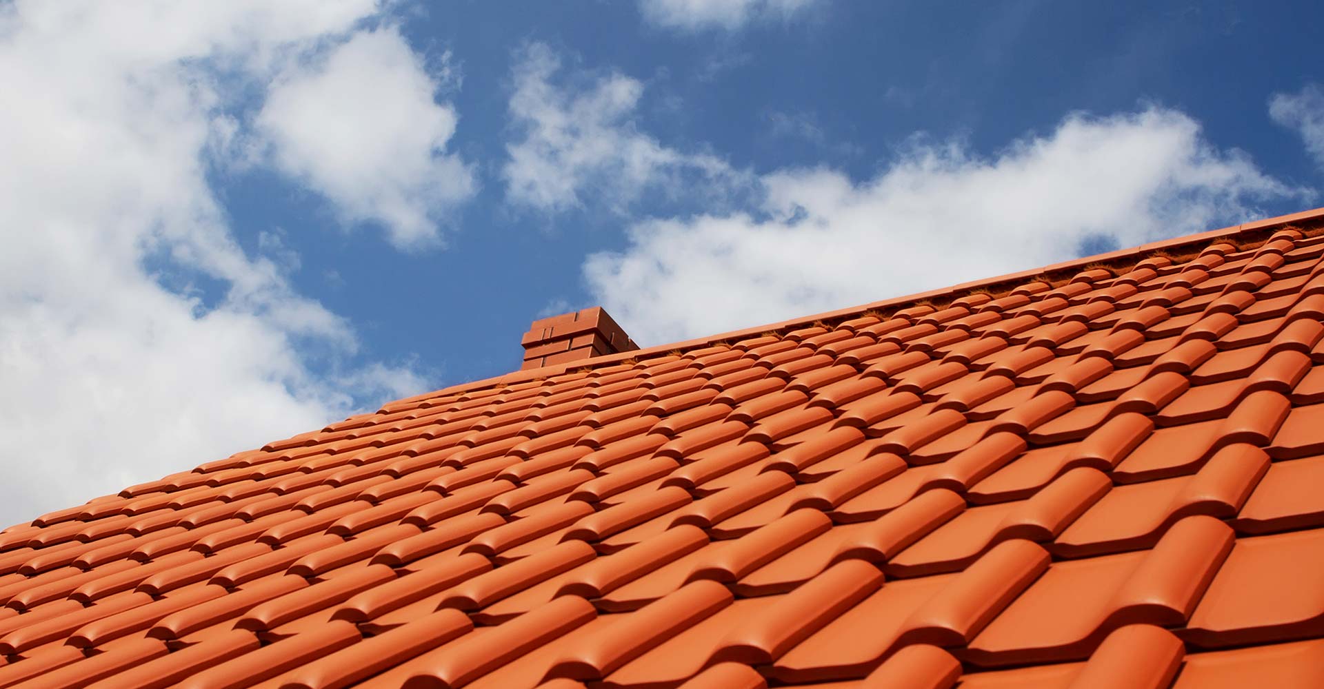 New clay tiled roof installation